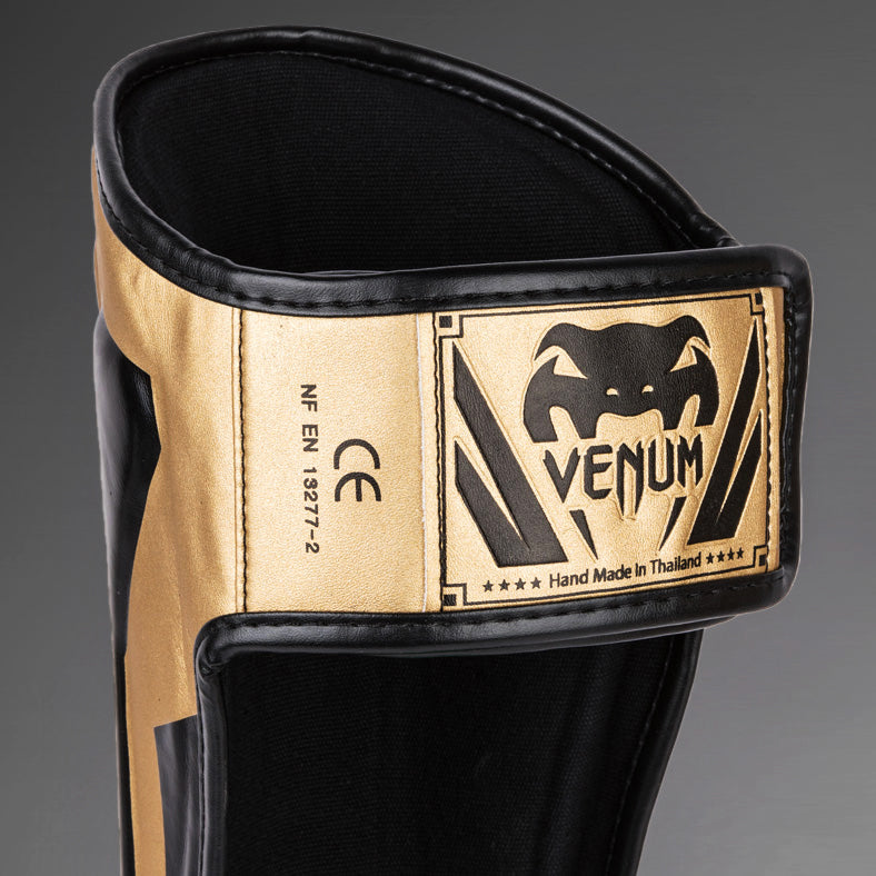 Venum Elite Стоячие щитки для голени - золото/черный