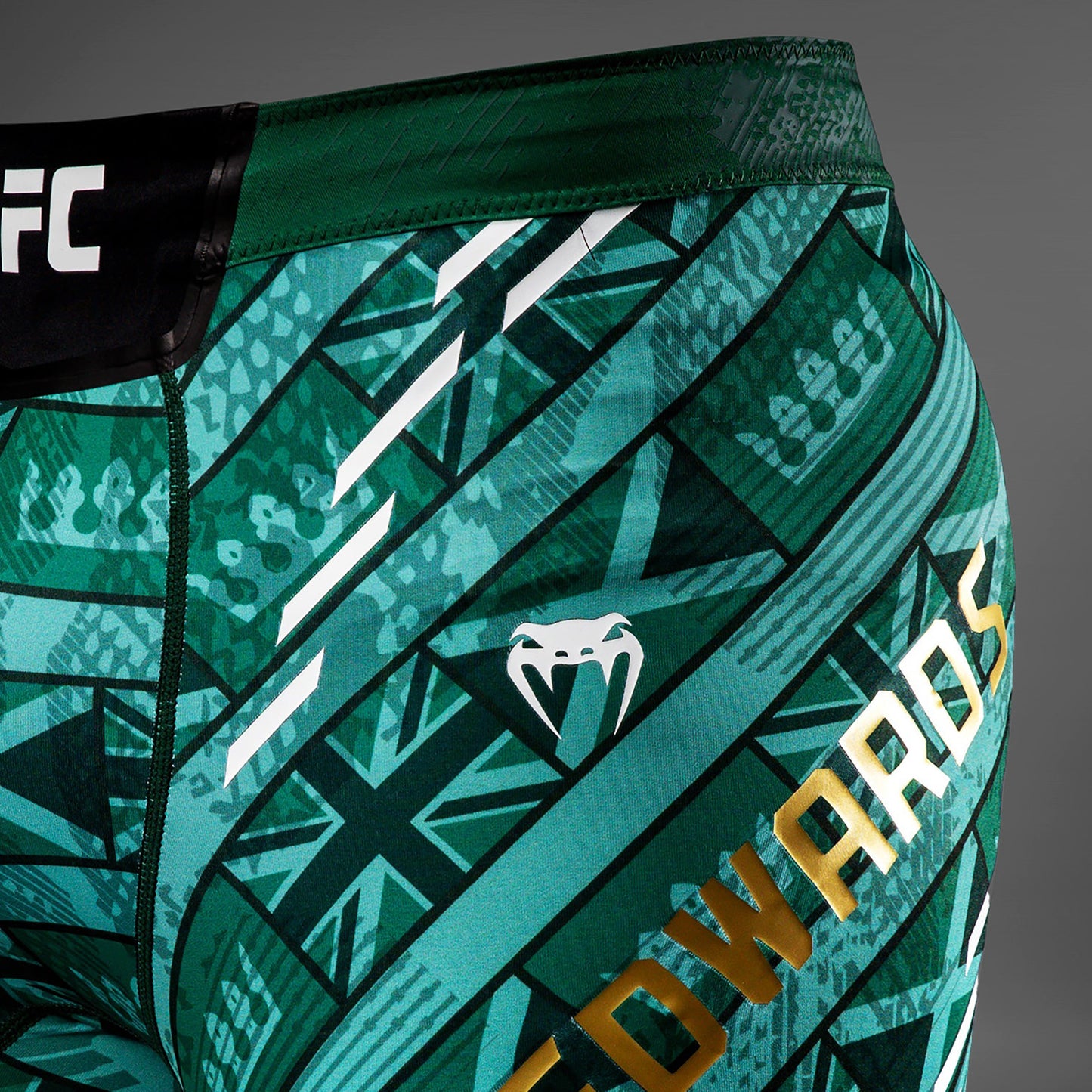 UFC Unrivaled by Venum Леон Эдвардс Унисекс Шорты Vale Tudo - Зеленый