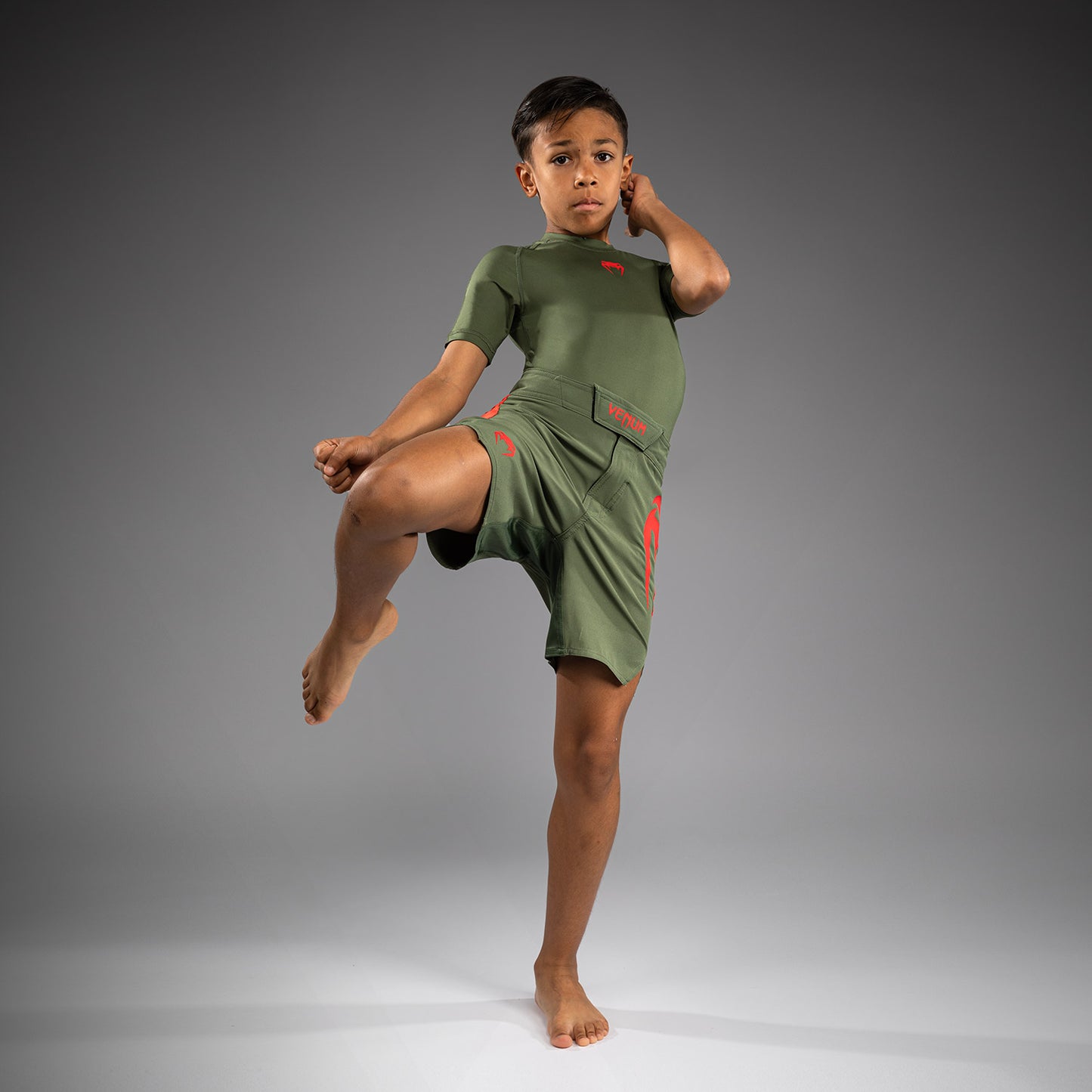 Venum Light Kids Fightshorts - Армейский Зеленый/Оранжевый