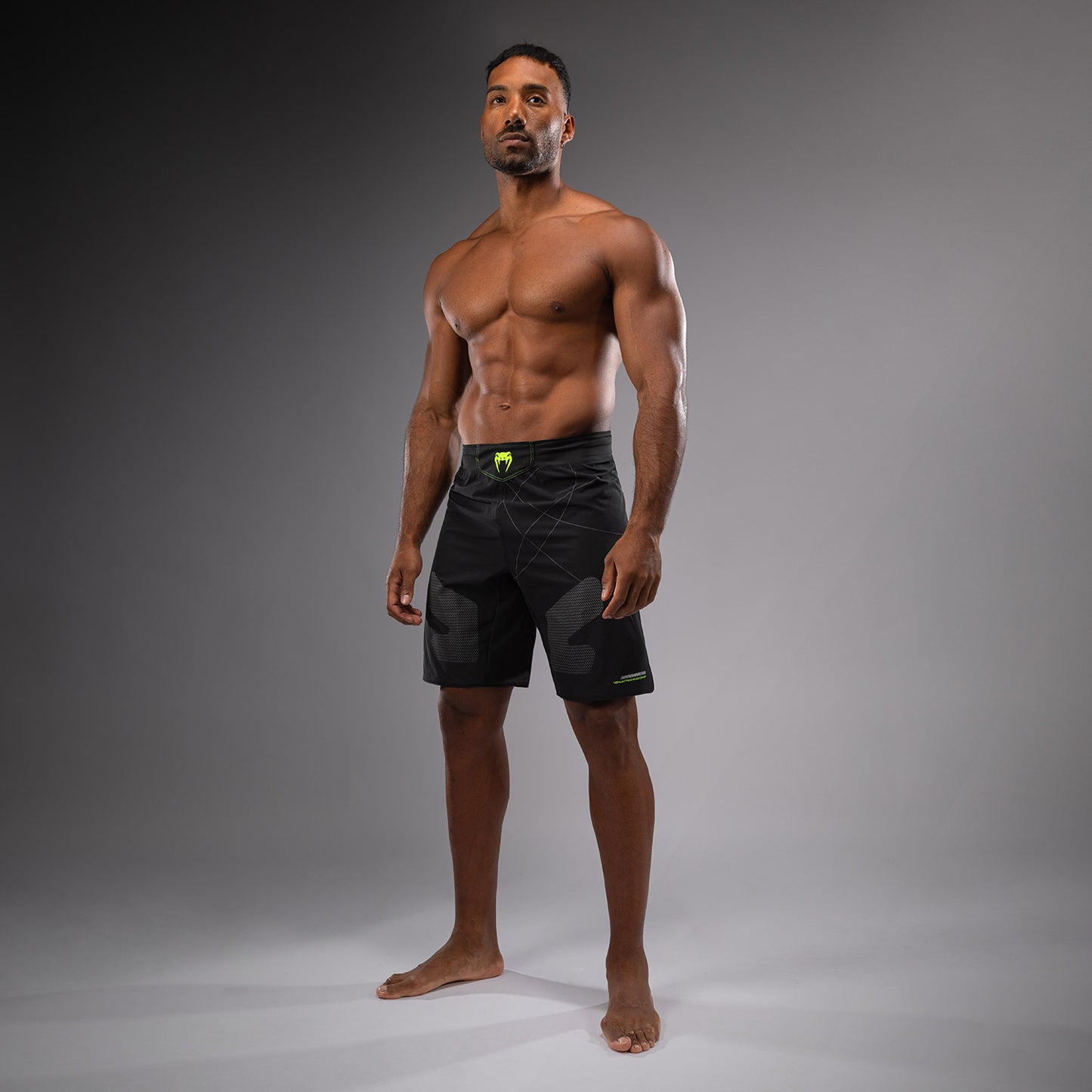 Venum Training Camp 4.0 Мужские боевые шорты - черный/неоновый зеленый