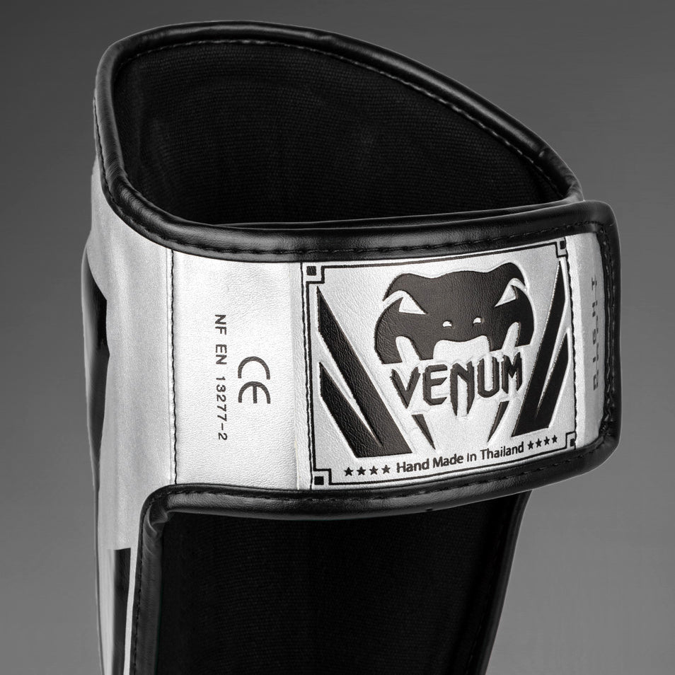 Venum Elite Щитки Вставать — серебристо-черные