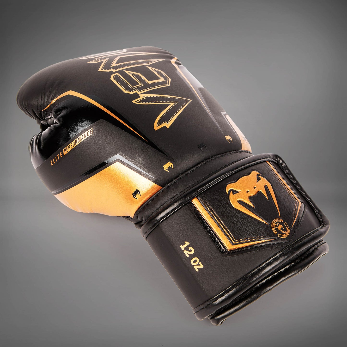 Боксерские перчатки Venum Elite Evo - черный/бронзовый