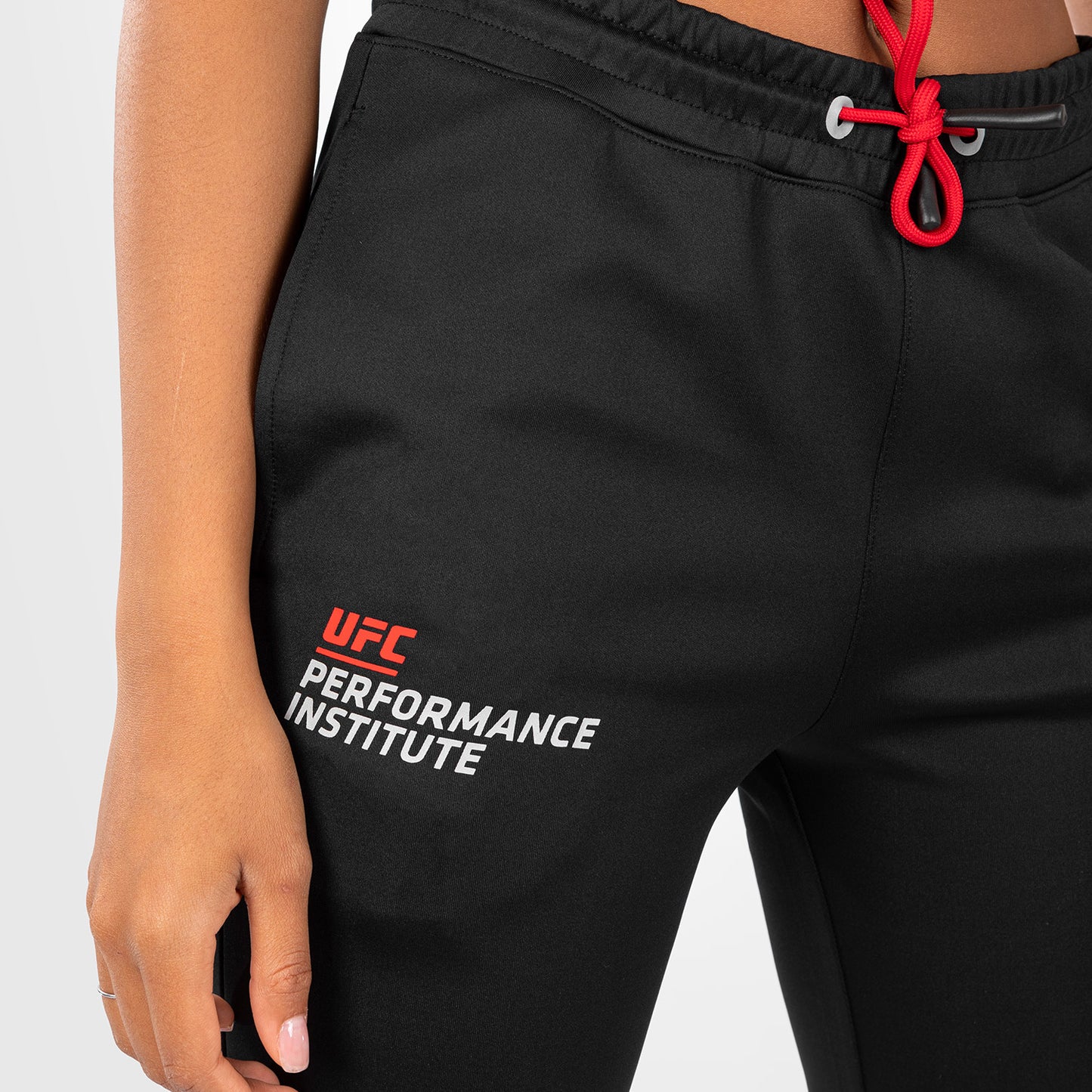 UFC Venum Performance Institute 2.0 Женские брюки для бега - черный/красный