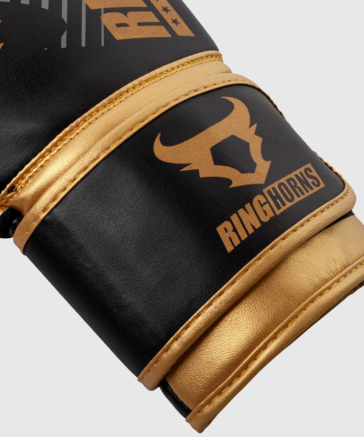 Боксерские перчатки Ringhorns Charger MX - Черный/Золотой